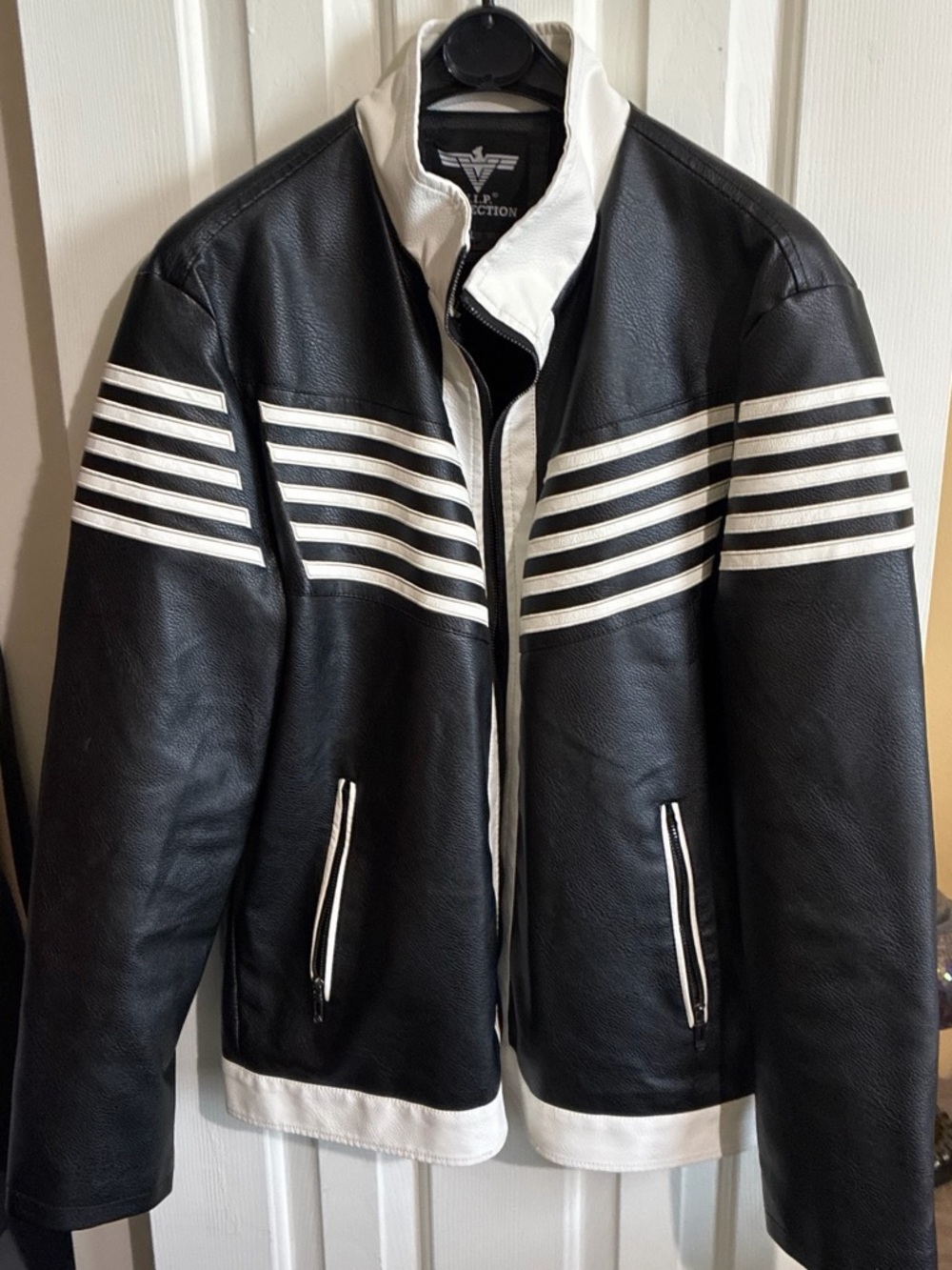 VIP Black PU leather jacket with white stripes.